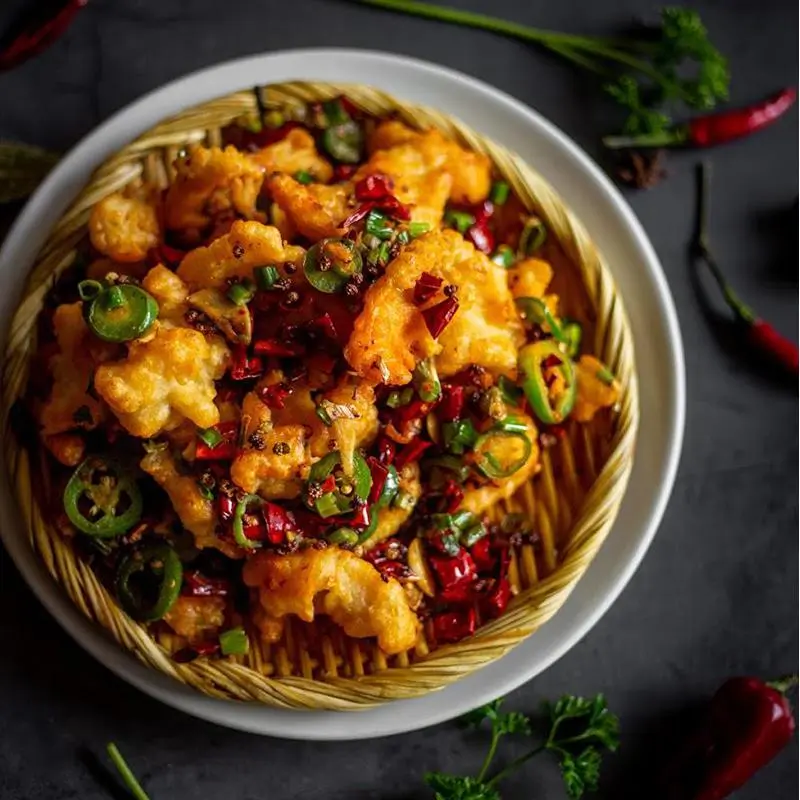 Crispy fried fish fillets with chili peppers and green onions at Ya Ya, a Chinese Restaurant in Houston